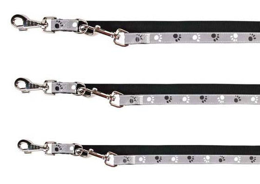 Šviesą atspindintis pavadis su pėdutėmis